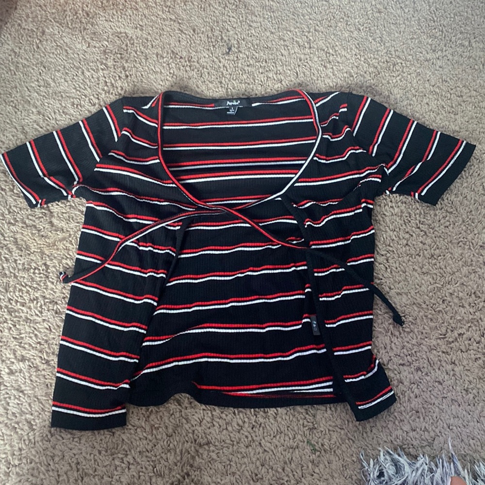 A stripped crop top that ties in the front.